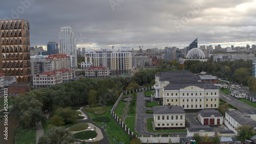 The view from the drone.Beautiful Yekaterinburg.Stock footage.Gray City, the largest of the Urals, filmed in the center of the city with all the high-rises and the long Iset River is visible.