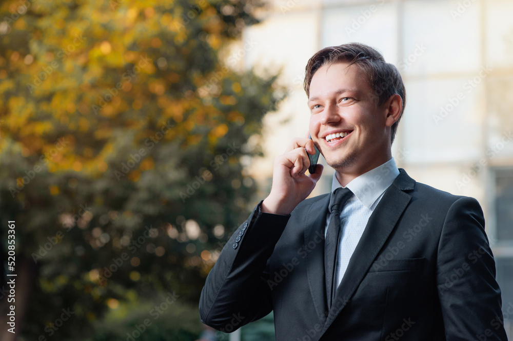 Man in formalwear talking on the mobile phone Man in formalwear talking on the mobile phone