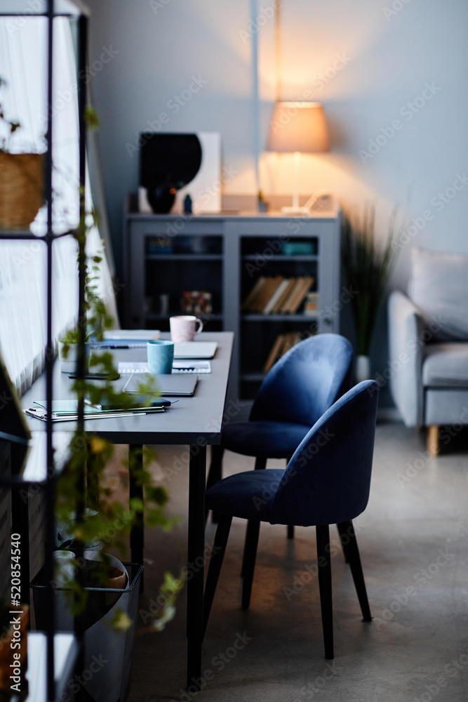 © Seventyfour - Vertical background image of modern home interior with dark loft furniture design