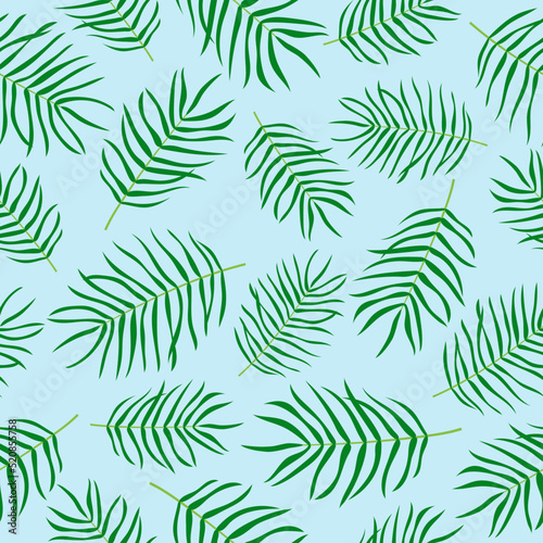 Palm leaves seamless pattern. Green plants on blue background