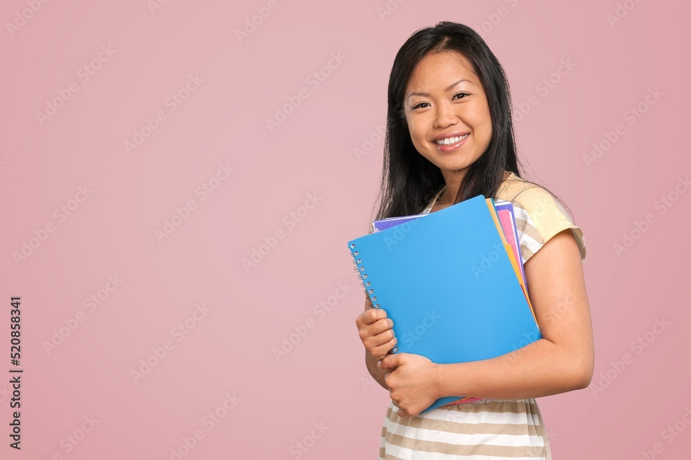 Young student posing over background, study concept Young student posing over background, study concept