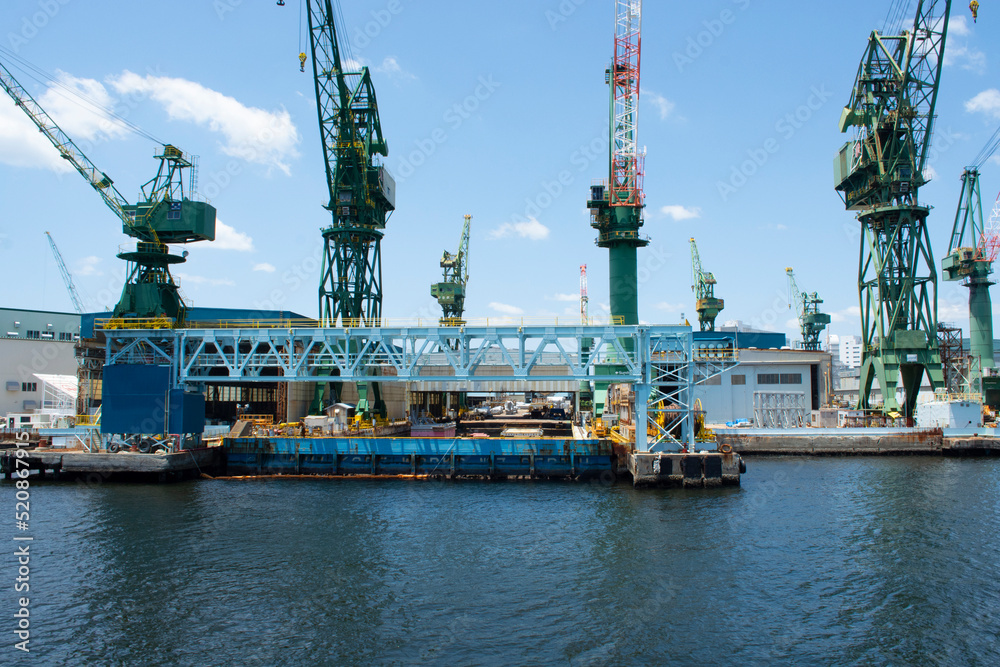 Ship yard cranes in harbour of Kobe, Japan