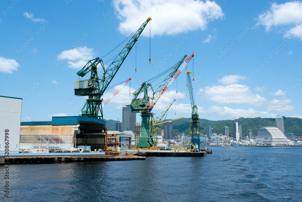 Ship yard cranes in harbour of Kobe, Japan