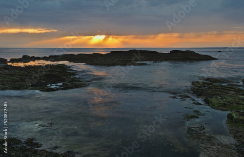 Typical Brittany coast at the Quiberon in the north-wets of France. Cloudy sky before rain. © dannywilde