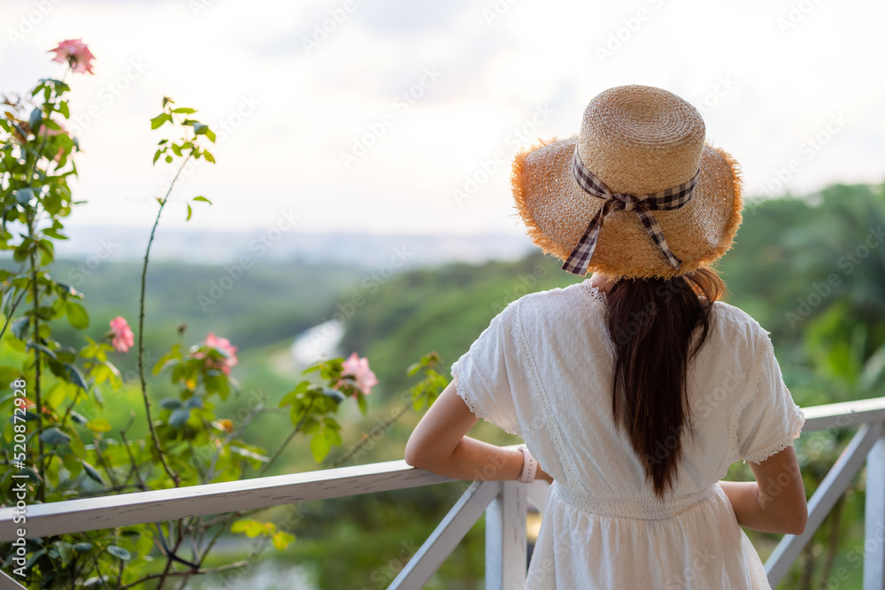 Woman enjoy the scenery view in countryside