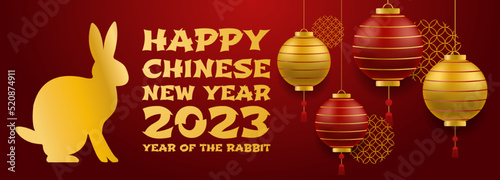 Chinese new year 2023 of the rabbit with realistic, rose gold and red baubles. China gold gradient text. Golden hare on a red background. Vector illustration