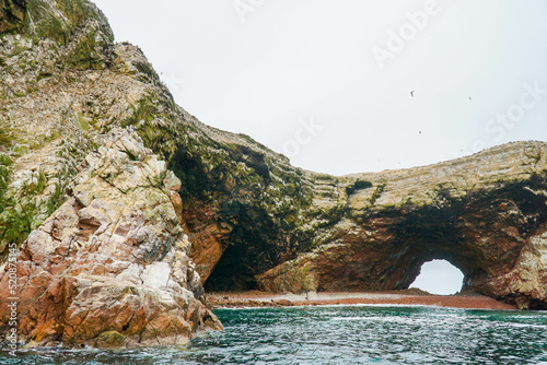 Amazing view of Ballestas islands, a national  reserve in Pisco Bay, PAracas, , Peru. where you can see many birds, sea lions and the Candelabro geoglyph  of Paracas Peninsula