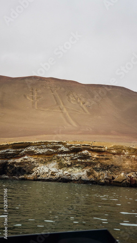 Amazing view of Ballestas islands, a national  reserve in Pisco Bay, PAracas, , Peru. where you can see many birds, sea lions and the Candelabro geoglyph  of Paracas Peninsula