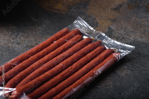 Smoked Sausages are in Packaging Without Label. Place for Label. Finished Meat Products