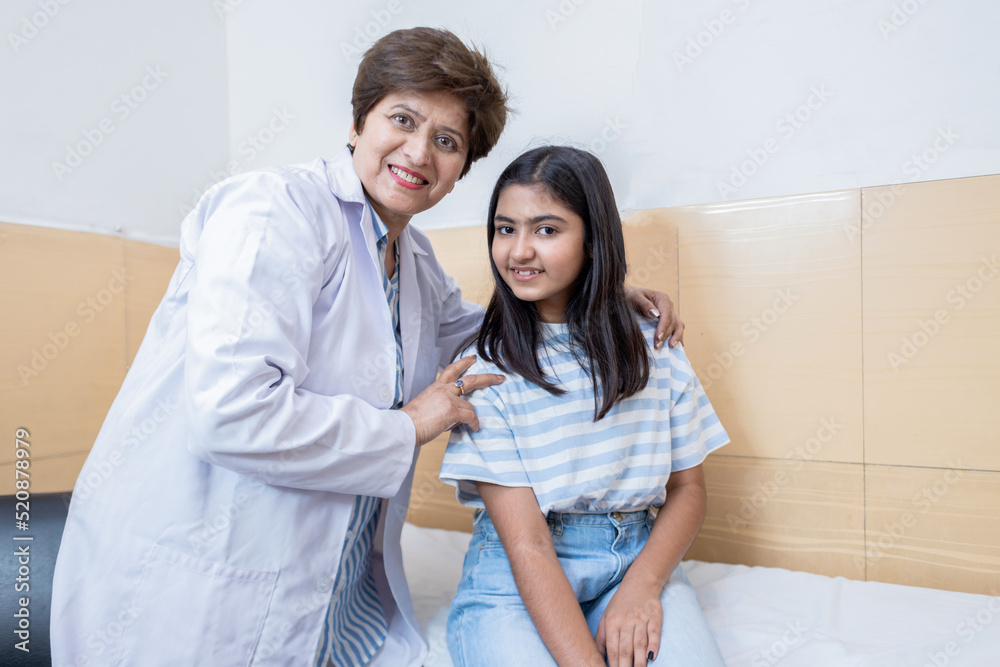 smiling doctor with patient kid smiling doctor with patient kid