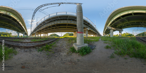 Fototapeta Naklejka Na Ścianę i Meble -  Spherical 360 degree panorama of railway tracks under reinforced concrete structure of road bridge.Full equirectangular projection for virtual reality or VR.