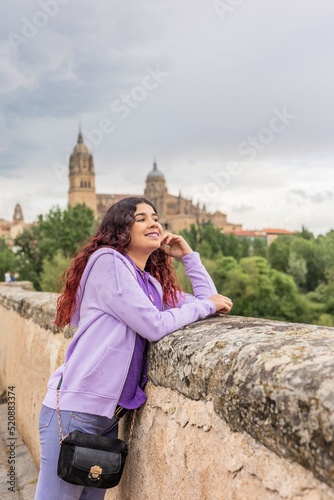 Salamanca spain tourism unesco architecture in europe. young latin venezuelan woman travel