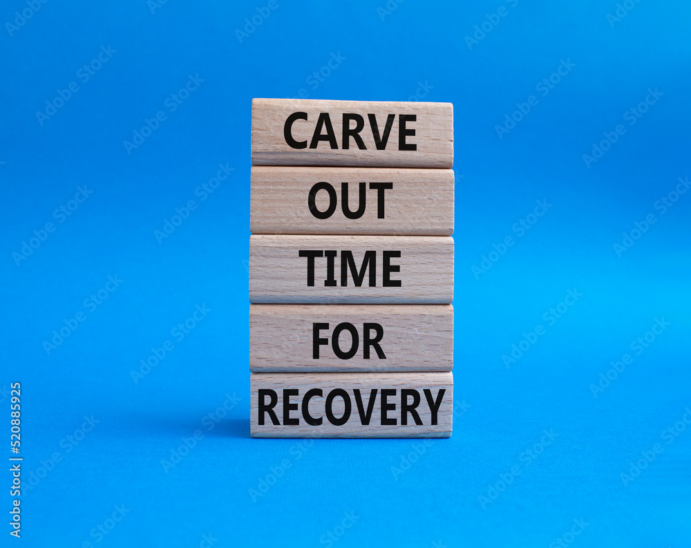 Carve out time for recovery symbol. Wooden blocks with words Carve out time for recoveryg. Beautiful blue background. Business and Carve out time for recovery concept. Copy space. Carve out time for recovery symbol. Wooden blocks with words Carve out time for recoveryg. Beautiful blue background. Business and Carve out time for recovery concept. Copy space.
