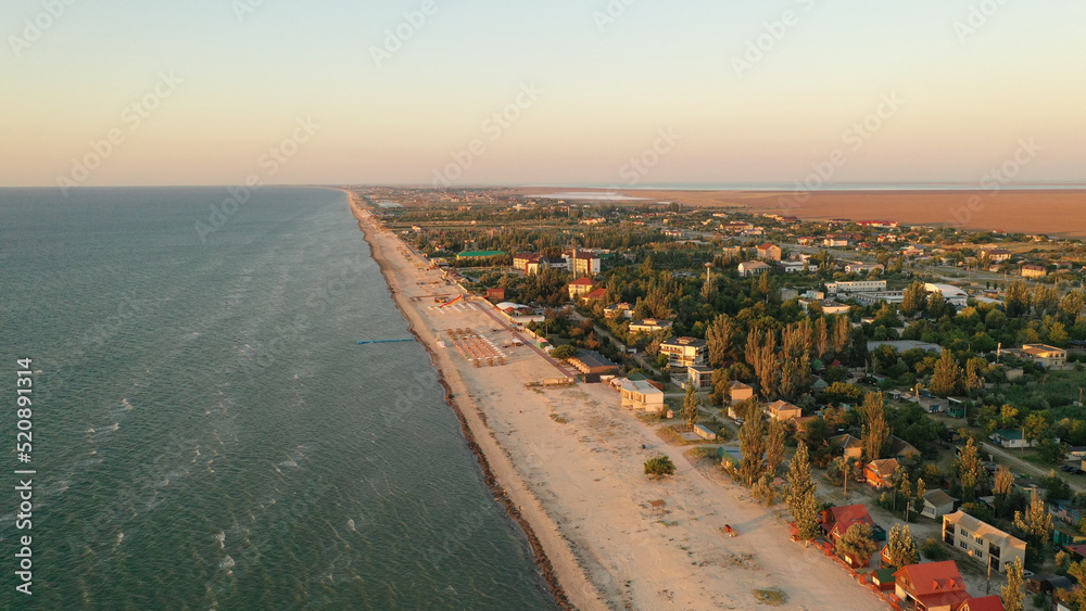 Panorama of sea shore in South Ukraine, Europe. Resort city with nice sand beach and clear blue sea. travel destination, ideal place for comfort vacation on black Sea. Drone photo