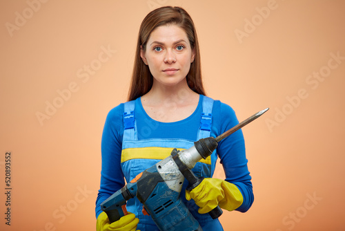 woman worker in blue overalls. Isolated female portrait.