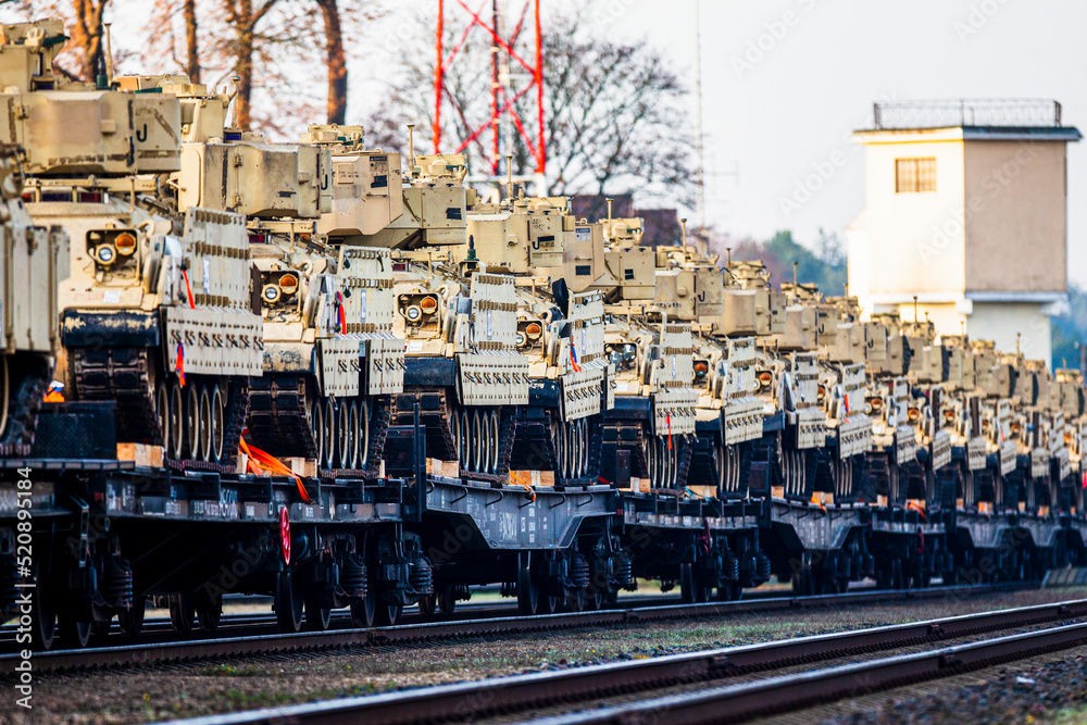 Naklejka premium Pabrade/Lithuania October 21, 2019 US Army's 1st Armoured Battalion of the 9th Regiment, 1st Division from Fort Hood in Texas Bradley is unloaded as they arrive at the Pabrade railway station.