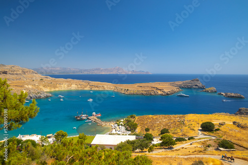 View of the Lindos beach and surrounding landscape of east cost Rhodes island near of Lindos town, Greece, Europe.