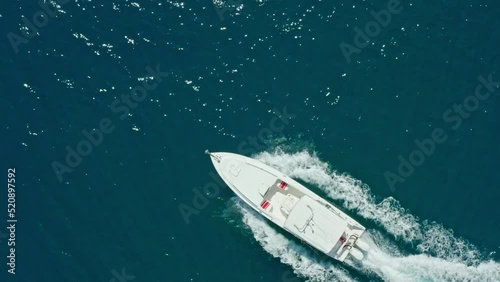 Wallpaper Mural Aerial view of a motor boat sailing on the sea. A luxury yacht rides fast on the waves of the ocean. High quality 4k footage Torontodigital.ca