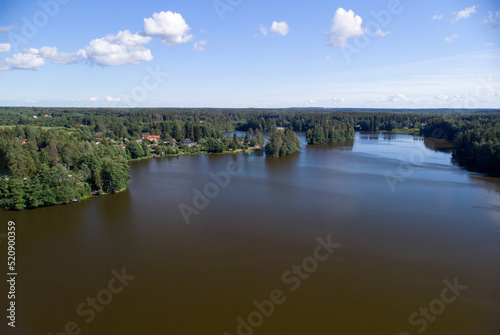 Lakes of the Karelian isthmus aerial view. Leningrad region in summer. Peat lakes in a green forest. © Svetliy