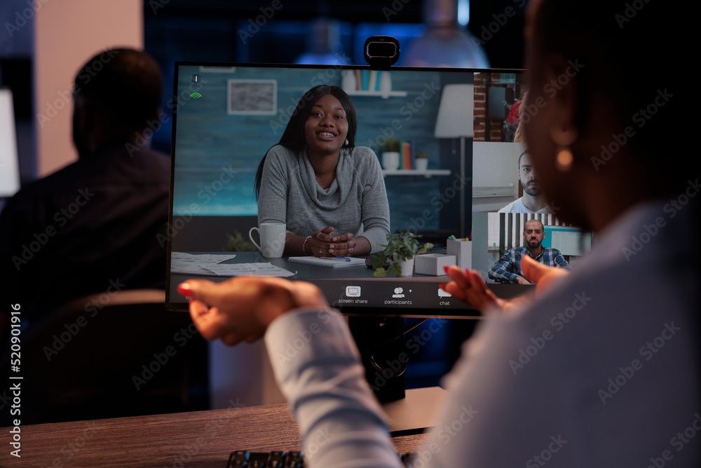 Company worker talking to colleagues on remote videoconference, using online telework videocall to chat about startup job. Discussing on internet teleconference meeting with webcam.