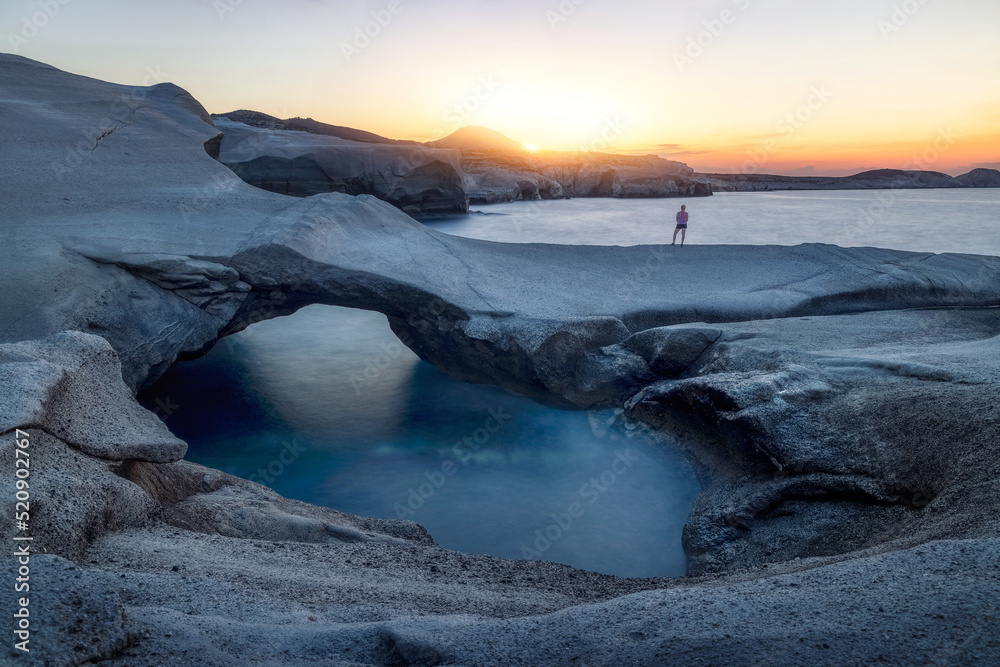 Fototapeta premium Sunset at Sarakiniko Beach in Milos Island, Cyclades, Greece