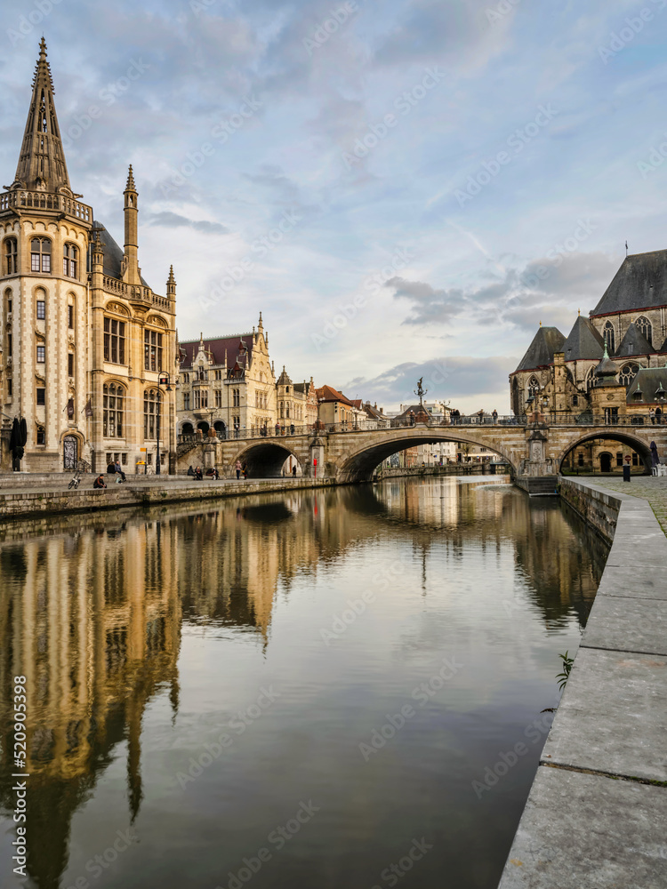 Leie river and historic medieval building in Ghent, Belgium