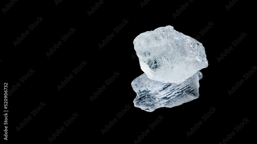 Isolated clear alum cubes on dark background concept for spa and body deodorant industrial