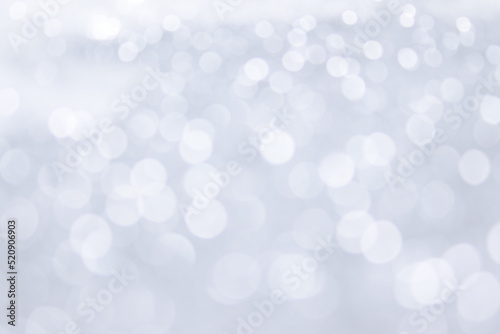 abstract blur white and gray color background with white bokeh lights defocused.