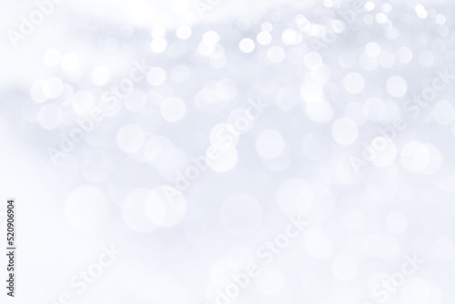 abstract silver white bokeh lights background © phadungsakphoto