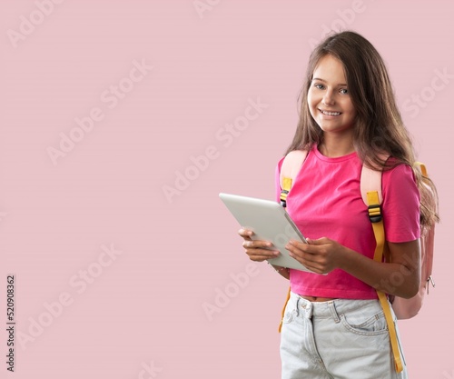 Young student over pink background, study concept