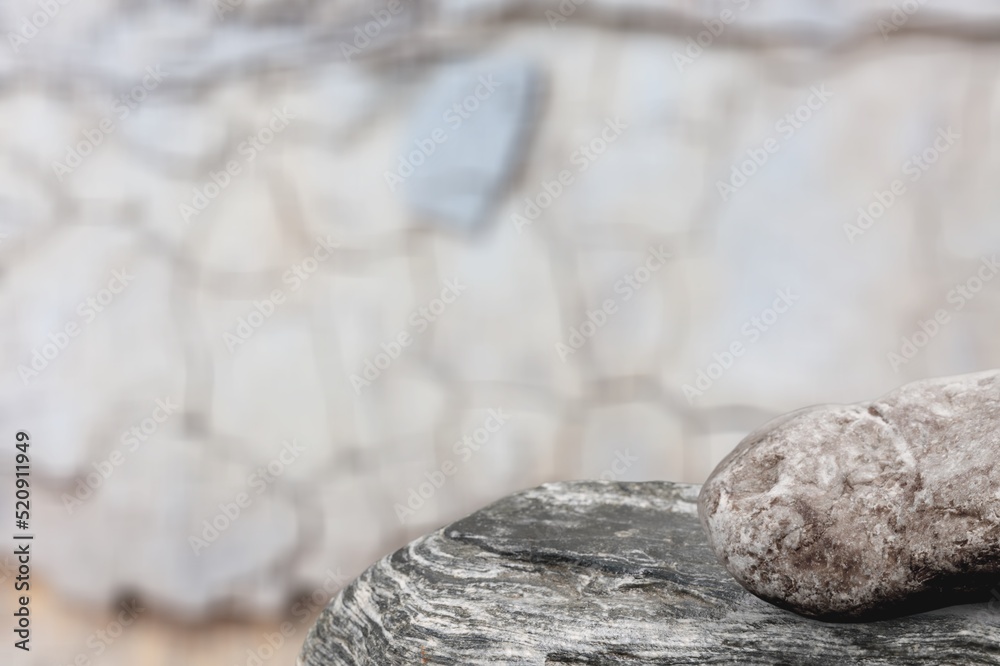 A Rock Shelf for a Product Display, Flat Surface of the Textured Stone, with a Light Background. A Rock Shelf for a Product Display, Flat Surface of the Textured Stone, with a Light Background.