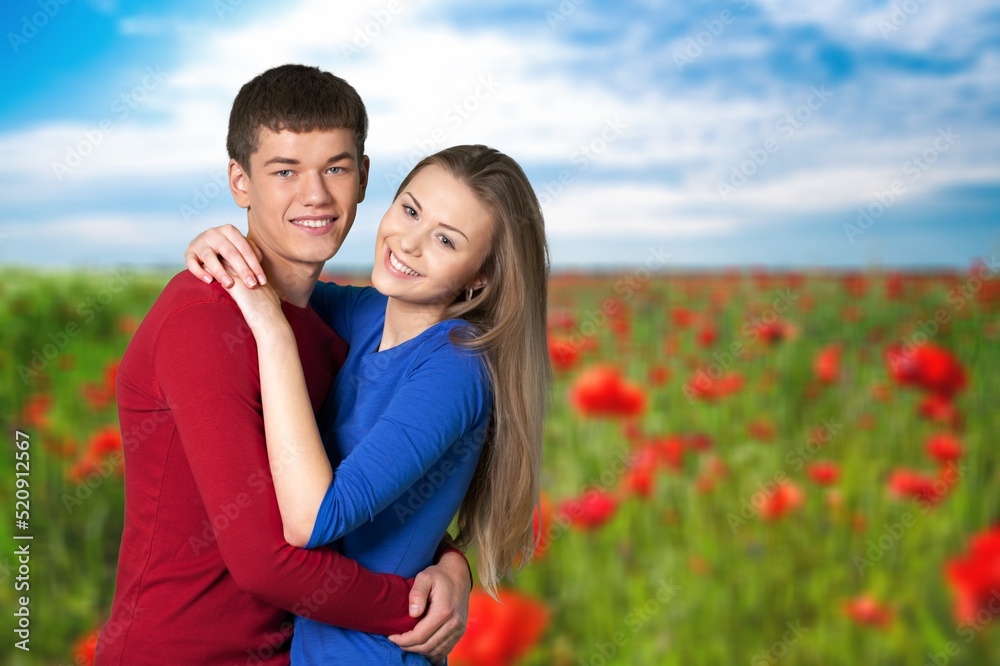 A couple being romantic while posing. Love and relationships outdoors. A couple being romantic while posing. Love and relationships outdoors.