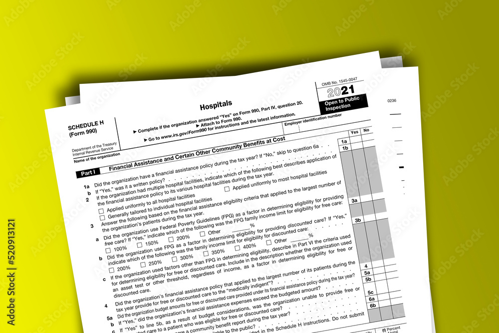 Form 990 (Schedule H) documentation published IRS USA 11.19.2021. American tax document on colored Form 990 (Schedule H) documentation published IRS USA 11.19.2021. American tax document on colored