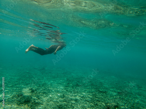 Snorkelling activity at island © taffpixture