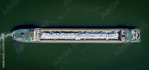 Ship over the Danube river near Vidin, Bulgaria drone shot from above photo