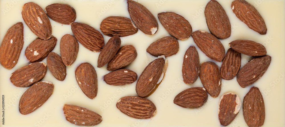 bar of white milk natural chocolate with roasted whole almonds bar of white milk natural chocolate with roasted whole almonds