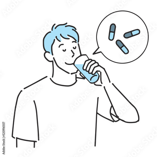 水で薬のカプセルを飲む男性