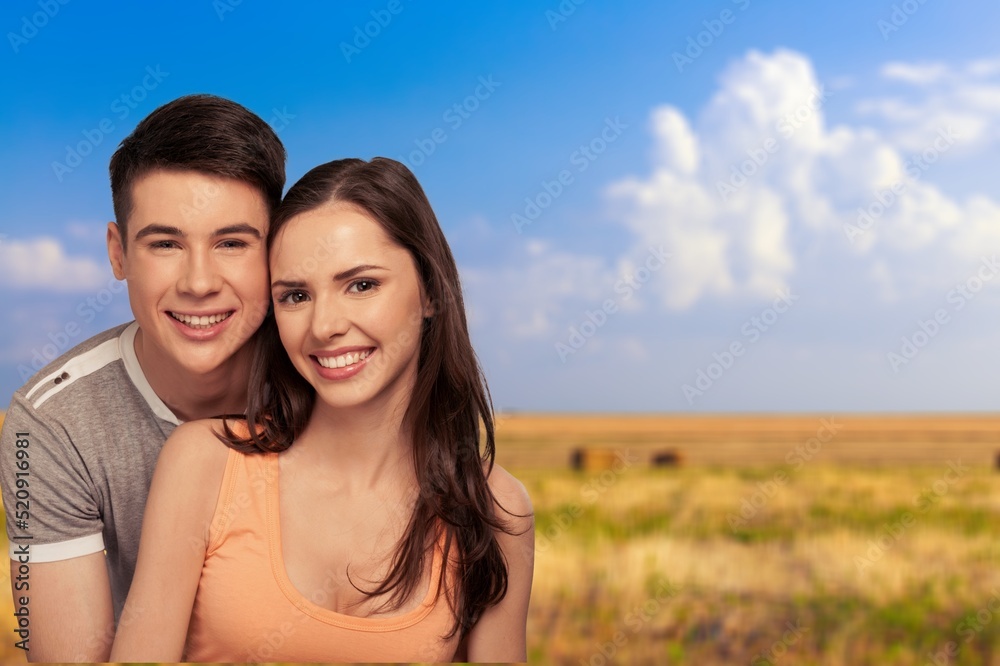 A couple being romantic while posing. Love and relationships outdoors. A couple being romantic while posing. Love and relationships outdoors.