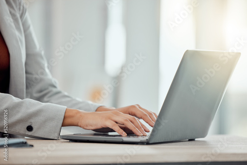 Closeup hands of manager typing on laptop, reviewing employee contracts or planning office schedule. Human resource professional, hiring boss or leader innovating team building exercise on technology