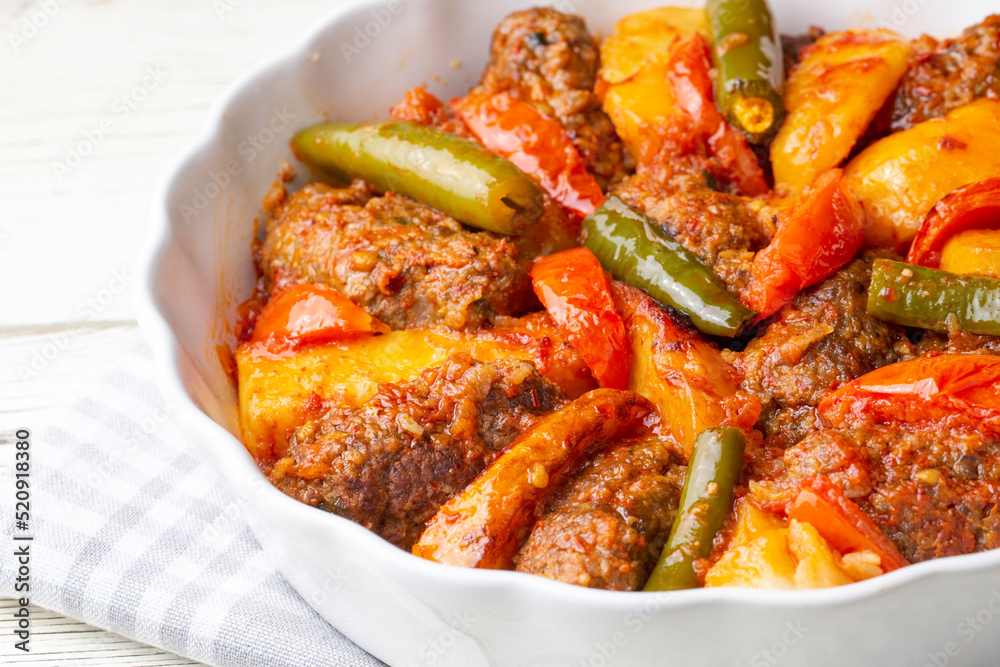 Traditional Homemade Turkish Food Kofte - Kofta with Tomato Sauce and Potatoes. (Turkish name; Izmir kofte) Traditional Homemade Turkish Food Kofte - Kofta with Tomato Sauce and Potatoes. (Turkish name; Izmir kofte)