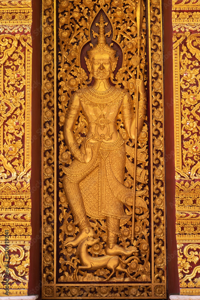 Interior door of Wat Phra That Cho Hae, Phrae Province, Thailand.