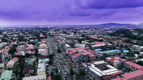 Ascending aerial view of the Banex Plaza Wuse 2 shopping area and neighborhood in Abuja, Nigeria photo