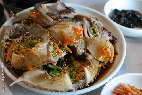 Korean traditional food eaten with fresh live crab seasoned with soy sauce