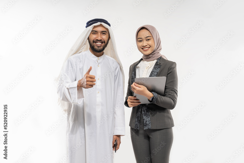 portrait of muslim business partner portrait looking at camera and thumb up portrait of muslim business partner portrait looking at camera and thumb up