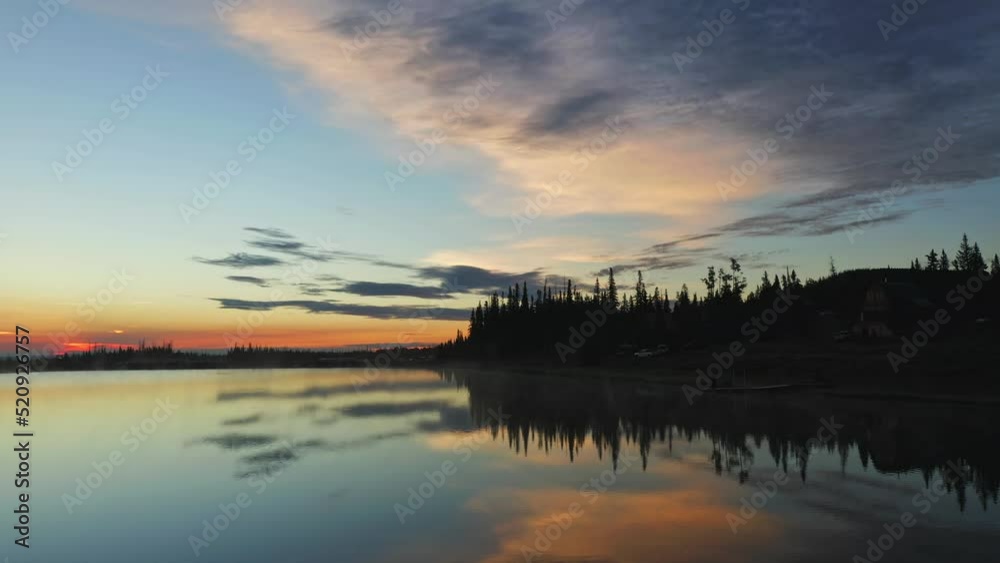 Sunrise on a beautiful lake in the forest Sunrise on a beautiful lake in the forest