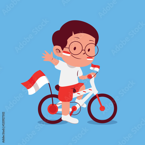 A cute boy with his decorated bicycle on Indonesia independence day event
