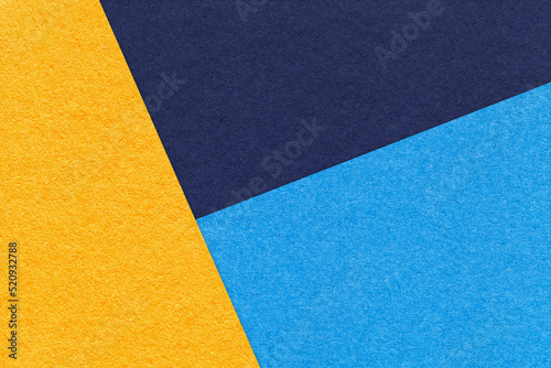 Quadro em tela Texture of craft yellow, navy blue and cerulean shade color paper background, macro
