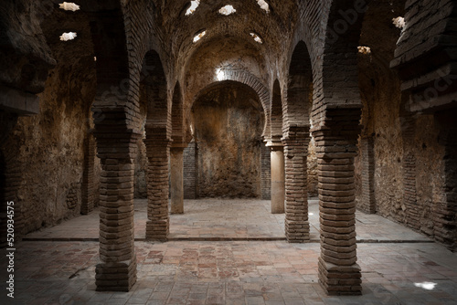 The ruins of the warm room inside the Arab baths  Ronda  Spain. Moorish architecture.