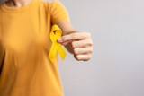 Yellow September, Suicide prevention day, Childhood, Sarcoma, bone and bladder cancer Awareness month, Yellow Ribbon for supporting people life and illness. Healthcare and World cancer day concept