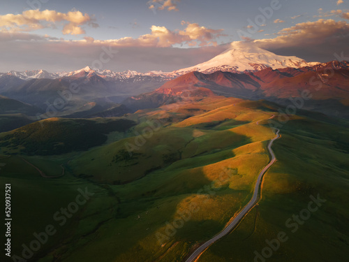 Elbrus mount at sunrise. Road to Gil-Su valley in North Caucasus, Russia.